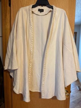 Patti LaBelle cream wool poncho jacket features beaded accents along open front